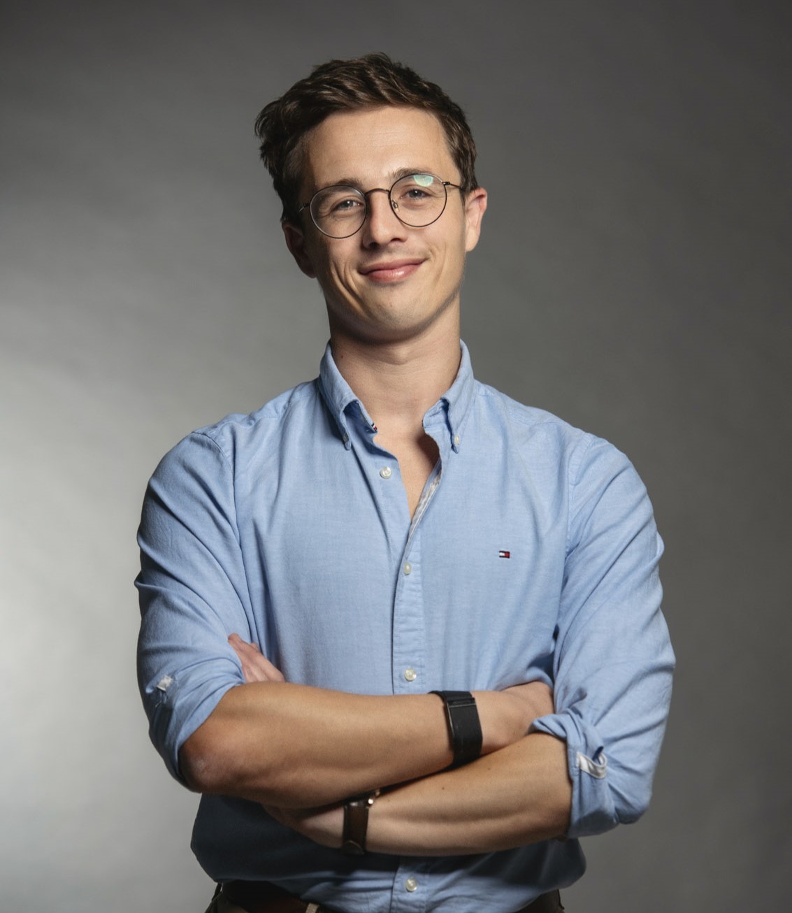 A professional headshot of Nicholas Borg